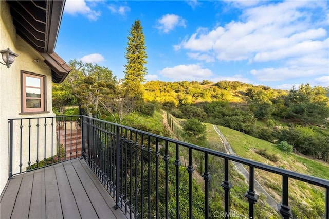 balcony with a forest view
