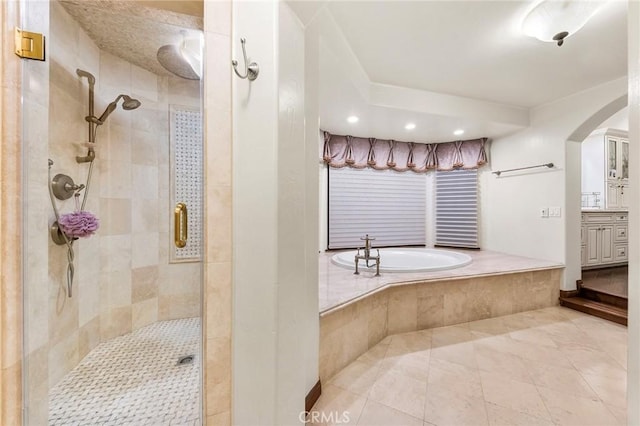 full bathroom with vanity, recessed lighting, tile patterned floors, a bath, and a shower stall