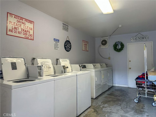 common laundry area featuring washing machine and dryer and visible vents
