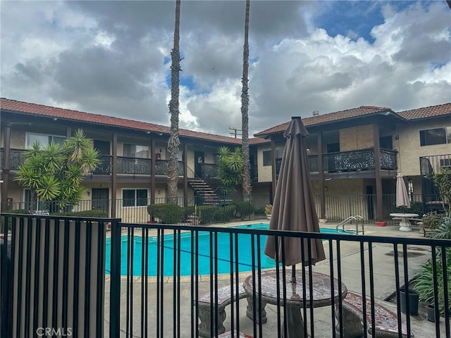 community pool with fence