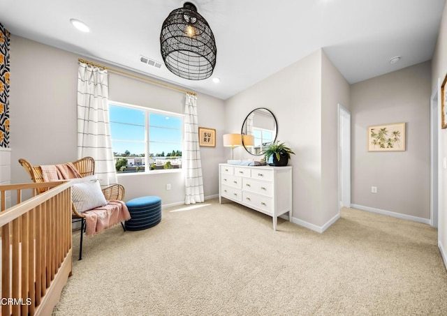 carpeted bedroom with recessed lighting, visible vents, and baseboards