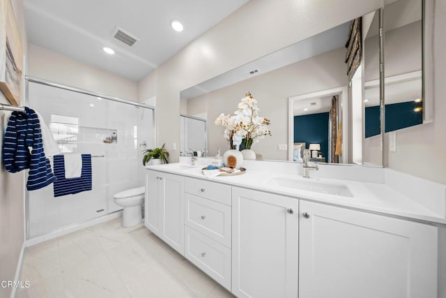 full bath featuring a sink, visible vents, toilet, and a shower stall