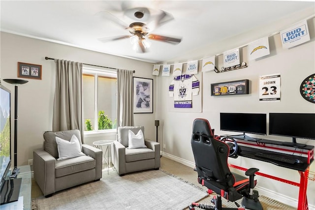 office with baseboards and ceiling fan