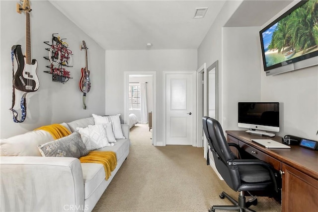 office area with visible vents and light carpet
