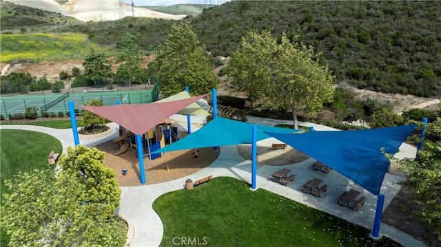 community jungle gym with fence
