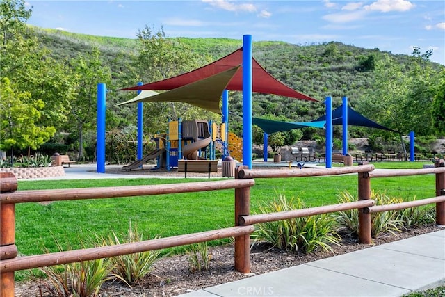 communal playground with a lawn
