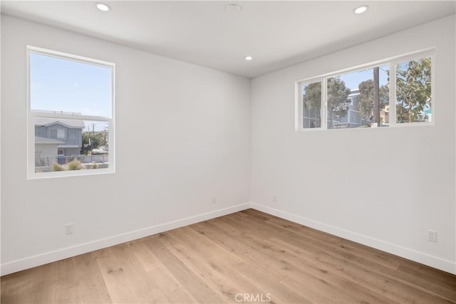 2100 Carnegie Ln, Redondo Beach, CA 90278 - unfurnished room featuring healthy amount of natural light, recessed lighting, and light wood-style flooring