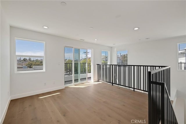 2100 Carnegie Ln, Redondo Beach, CA 90278 - empty room featuring wood finished floors and recessed lighting