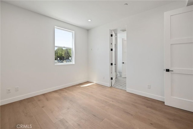 2100 Carnegie Ln, Redondo Beach, CA 90278 - unfurnished bedroom featuring light wood-style floors and recessed lighting