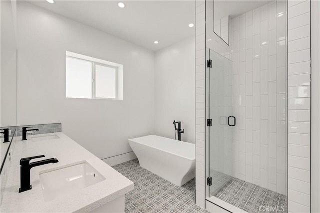 2100 Carnegie Ln, Redondo Beach, CA 90278 - bathroom featuring a shower stall, a freestanding tub, recessed lighting, and double vanity