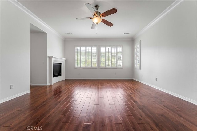 unfurnished living room featuring dark wood-type flooring, ceiling fan, ornamental molding, and visible vents
