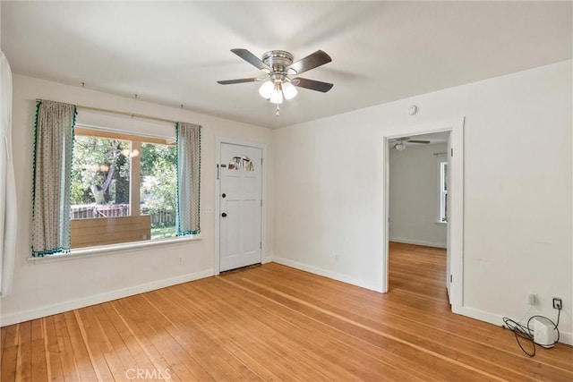 965 E 8th St, Chico, CA 95928 - spare room with a ceiling fan, hardwood / wood-style floors, and baseboards