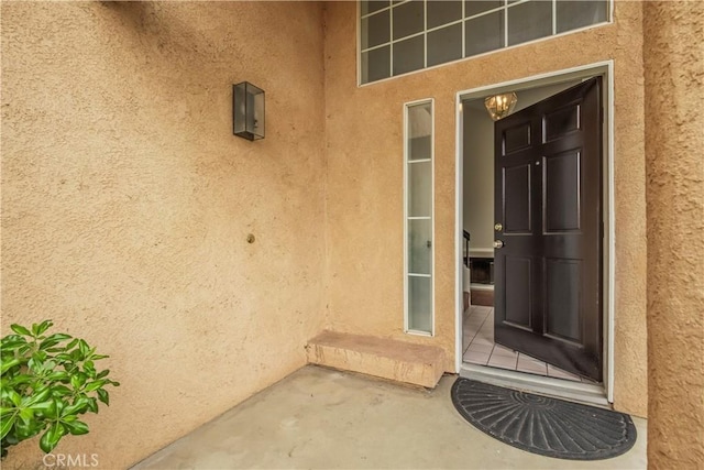 11962 Verona Dr, Fontana, CA 92337 - property entrance with stucco siding