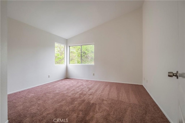 11962 Verona Dr, Fontana, CA 92337 - empty room featuring lofted ceiling, baseboards, and carpet floors