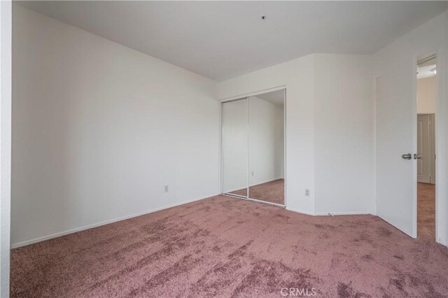 11962 Verona Dr, Fontana, CA 92337 - unfurnished bedroom with carpet floors, baseboards, and a closet