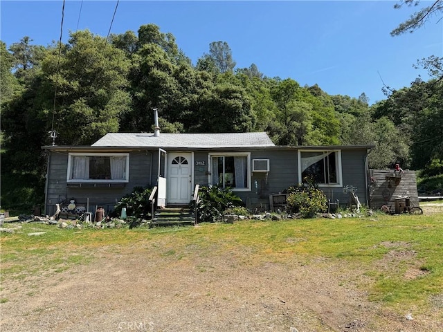 view of front of home featuring a front lawn