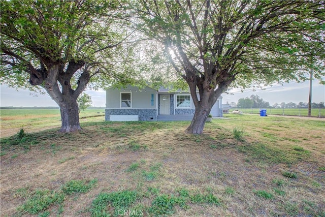 1124 S Moffett Rd, Turlock, CA 95380 - view of front of house featuring a front yard and stone siding
