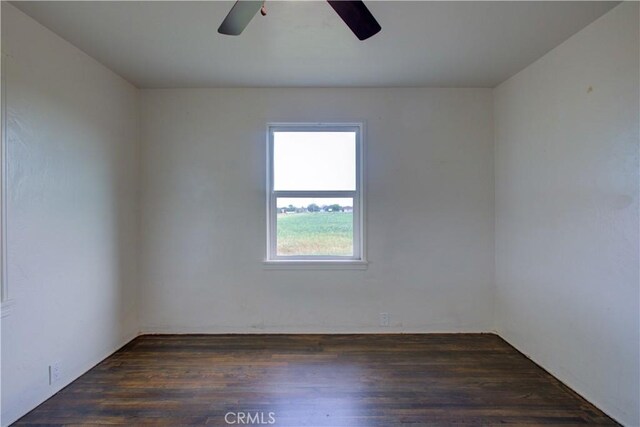 1124 S Moffett Rd, Turlock, CA 95380 - empty room featuring dark wood-style flooring and ceiling fan