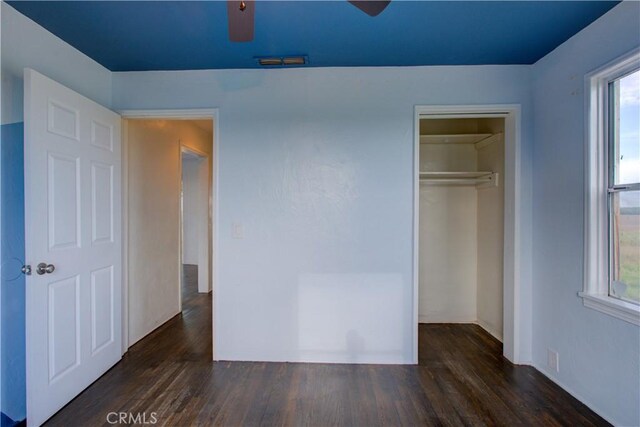 1124 S Moffett Rd, Turlock, CA 95380 - unfurnished bedroom featuring visible vents, a closet, and wood finished floors