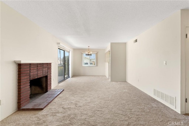 8751 Oasis Ave, Westminster, CA 92683 - unfurnished living room featuring visible vents, a notable chandelier, carpet floors, and a fireplace