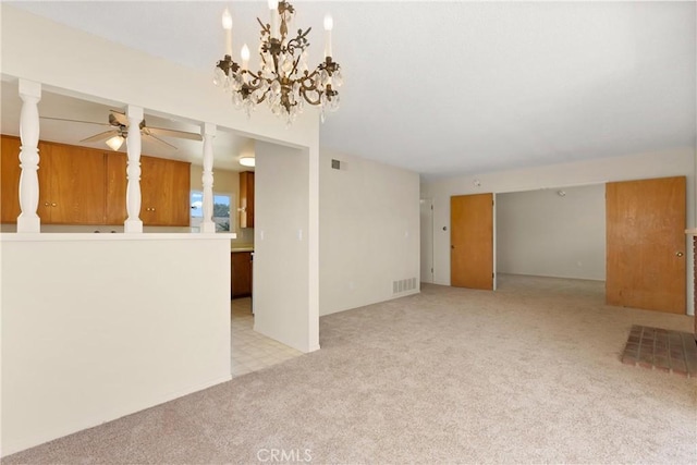 8751 Oasis Ave, Westminster, CA 92683 - unfurnished living room featuring carpet, visible vents, and ceiling fan with notable chandelier