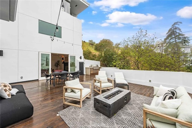 9027 Wonderland Ave, Los Angeles, CA 90046 - view of patio with an outdoor living space with a fire pit, a deck, and outdoor dining space