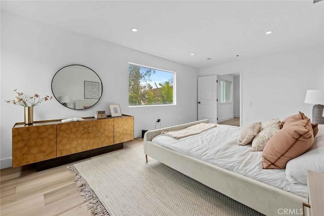 9027 Wonderland Ave, Los Angeles, CA 90046 - bedroom with light wood-style floors and recessed lighting