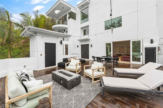 9027 Wonderland Ave, Los Angeles, CA 90046 - view of patio / terrace with an outdoor living space with a fire pit and a deck