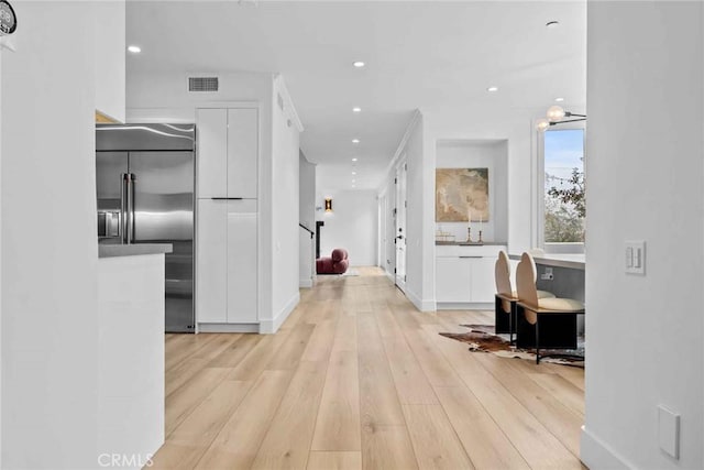 9027 Wonderland Ave, Los Angeles, CA 90046 - hallway featuring light wood-style floors and recessed lighting