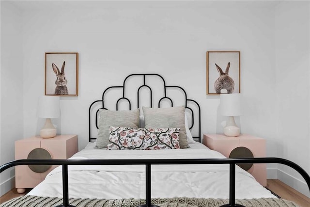 9027 Wonderland Ave, Los Angeles, CA 90046 - bedroom with baseboards and wood finished floors