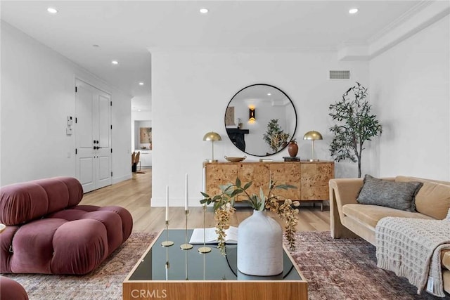 9027 Wonderland Ave, Los Angeles, CA 90046 - living room with wood finished floors, recessed lighting, and crown molding