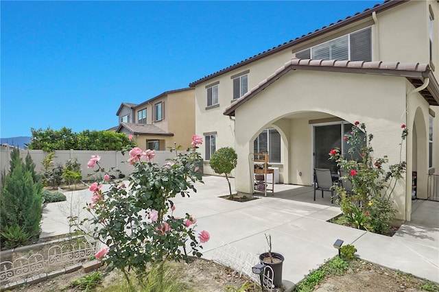 16533 Ground Breaker Ave, Chino, CA 91708 - back of property with a patio, stucco siding, and a fenced backyard