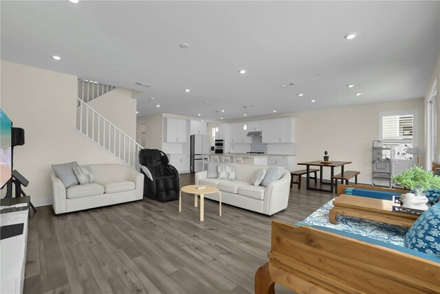 16533 Ground Breaker Ave, Chino, CA 91708 - living area with recessed lighting, stairway, visible vents, and wood finished floors