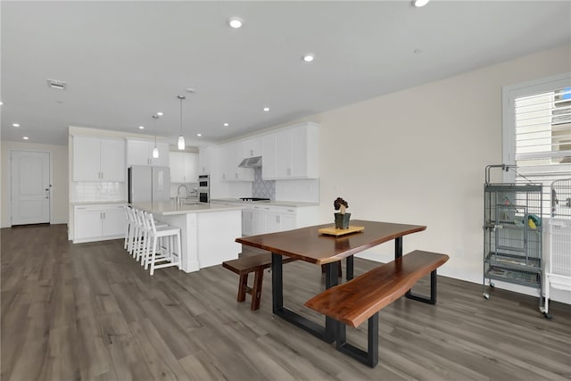 16533 Ground Breaker Ave, Chino, CA 91708 - dining room featuring recessed lighting, dark wood-style flooring, and visible vents