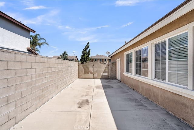 16569 Sugar Ln, Fontana, CA 92337 - view of patio featuring a gate