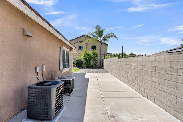 16569 Sugar Ln, Fontana, CA 92337 - fenced backyard featuring central AC unit and a patio