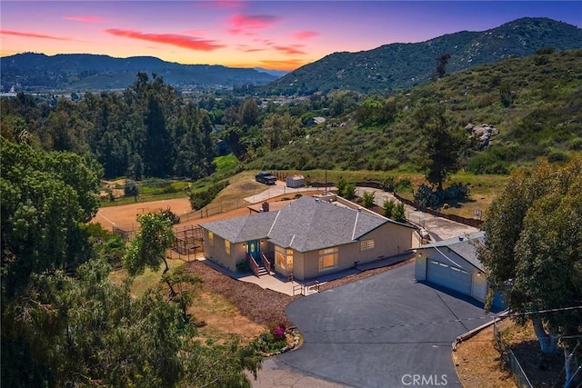 aerial view at dusk with a mountain view