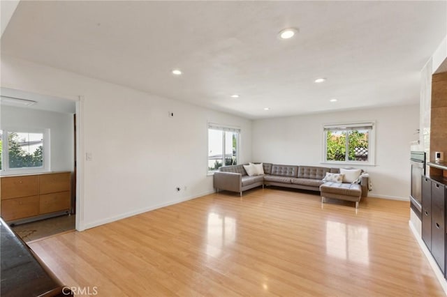 2652 La Salle Way, San Jose, CA 95130 - living room featuring light wood finished floors, recessed lighting, and baseboards