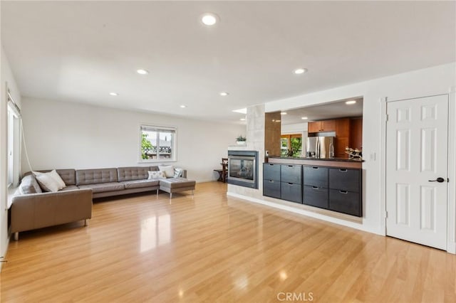 2652 La Salle Way, San Jose, CA 95130 - living area with light wood-type flooring, recessed lighting, and a large fireplace