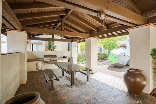 view of patio / terrace with area for grilling, a gazebo, and fence