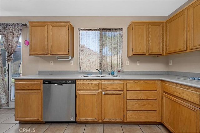 25382 Silverwood Ln, Menifee, CA 92584 - kitchen with stainless steel dishwasher, plenty of natural light, light tile patterned floors, and light countertops