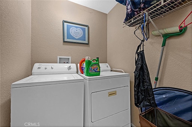 25382 Silverwood Ln, Menifee, CA 92584 - washroom with independent washer and dryer and a textured wall