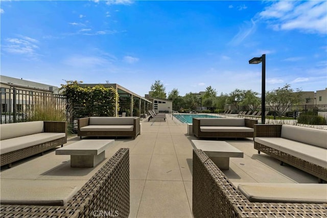 19533 Cardigan Dr, Northridge, CA 91324 - view of patio featuring a community pool, outdoor lounge area, and fence