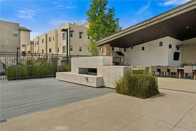 19533 Cardigan Dr, Northridge, CA 91324 - view of patio / terrace featuring a residential view, outdoor dining area, and fence