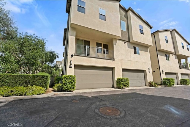 19533 Cardigan Dr, Northridge, CA 91324 - multi unit property with driveway, stucco siding, and an attached garage
