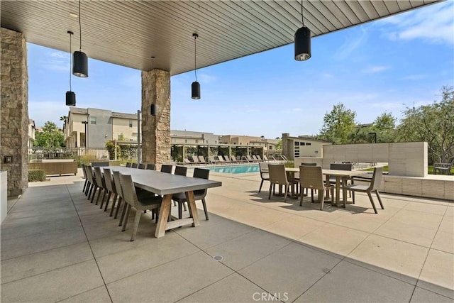 19533 Cardigan Dr, Northridge, CA 91324 - view of patio / terrace featuring outdoor dining space and a community pool
