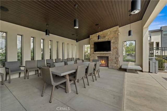 19533 Cardigan Dr, Northridge, CA 91324 - view of patio / terrace featuring outdoor dining area and an outdoor stone fireplace