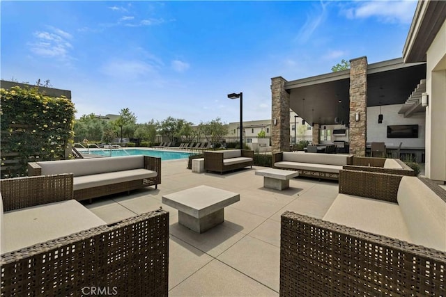 19533 Cardigan Dr, Northridge, CA 91324 - view of patio / terrace featuring a community pool and an outdoor hangout area