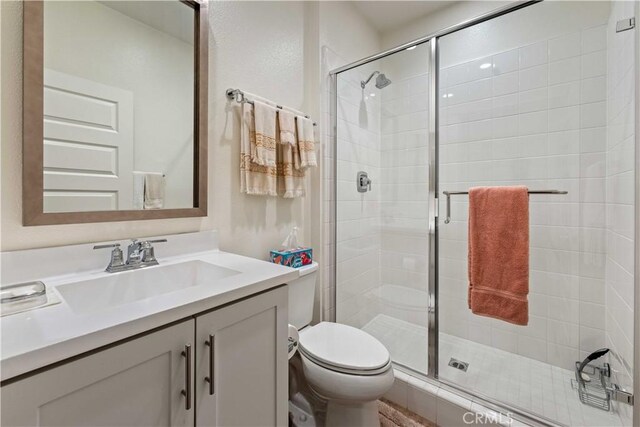 19533 Cardigan Dr, Northridge, CA 91324 - bathroom with a shower stall, vanity, and toilet