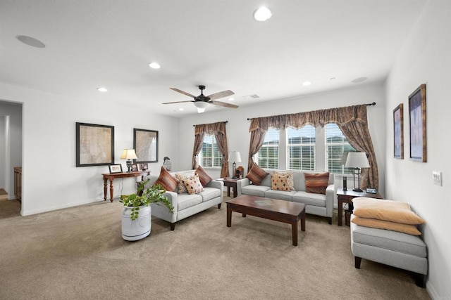 living room with recessed lighting, a ceiling fan, and light colored carpet